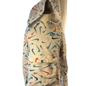 Kids Nike White Hoodie with Multicolor Swooshes.